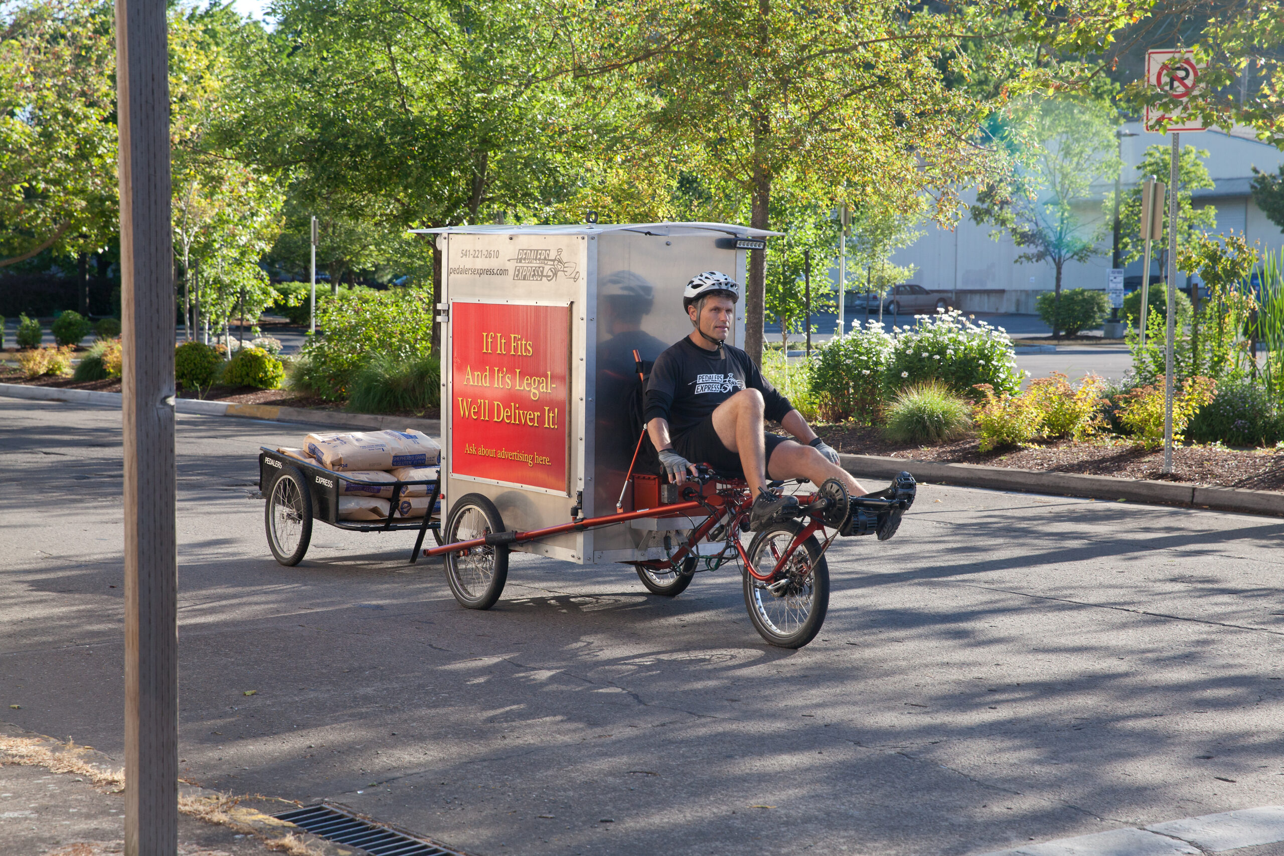 Eco-friendly courier service delivering packages by cargo bike in Eugene, OR