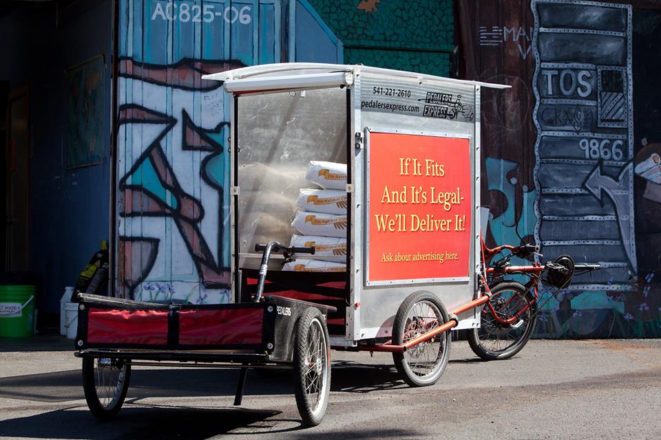 Cargo tricycle with trailer for same-day courier delivery in Eugene, OR